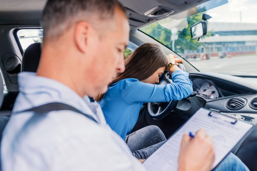 Woman saying a prayer before driving test - prayer for driving test