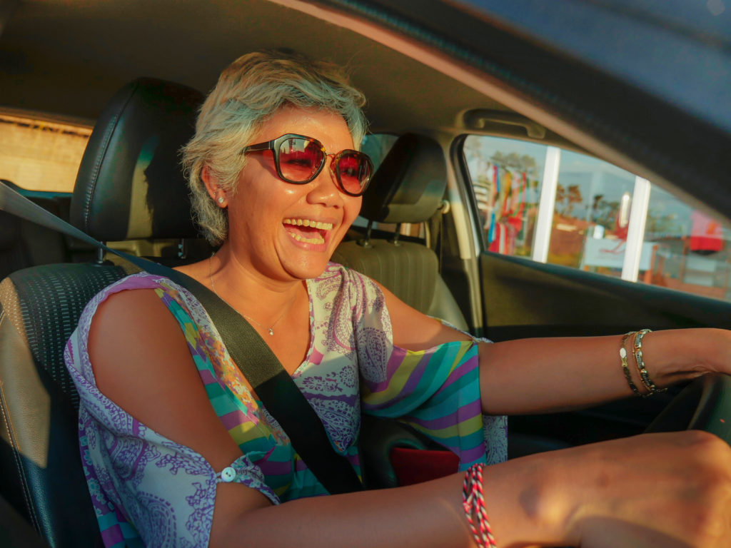 woman driving on the left